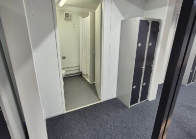 With the client seeking a single-order solution, our team also procured and installed a comprehensive range of supporting infrastructure and internal fit-out items, including: Hard PVC walling for screening and branding Heras fencing Benches for the changing rooms, including integrated shoe racks Treatment tables Internal and external floor coverings Lockers Miscellaneous furniture and ancillary equipment Alongside managing the installation of all modular buildings and equipment, our engineers carried out all plumbing requirements, including a fresh water supply and waste provision for the duration of the hire. A standby engineer also remained on site throughout the event to provide technical support and ensure everything went smoothly. The project wasn’t without its challenges given the location where the units needed to be sited. Within the outdoor broadcast area within the stadium, there were some logistical hurdles to overcome with bollards and low level lighting fixtures factored in. Delivered within a tight installation window, the project enabled Brentford FC to successfully host an international competition environment with the addition of welfare and performance facilities for the footballers, support teams and officials.